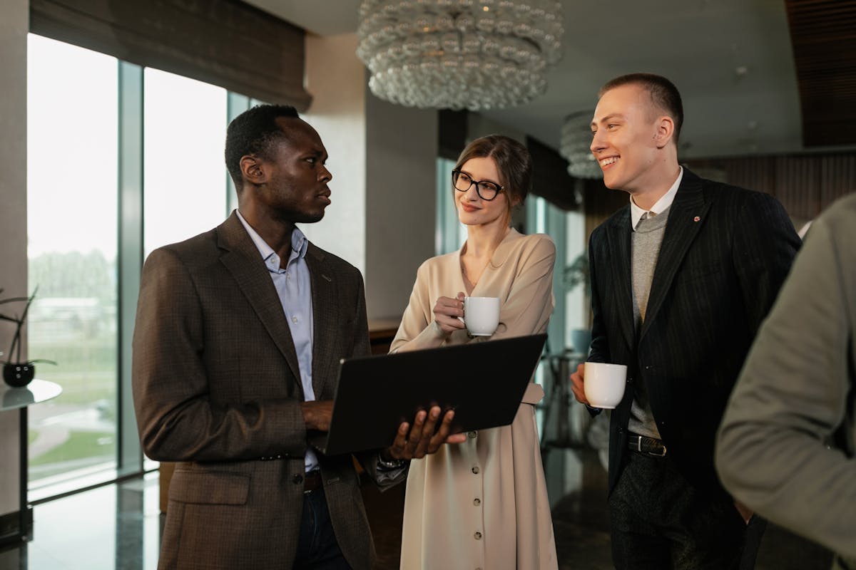 Team of professionals collaborating and networking in a modern office setting