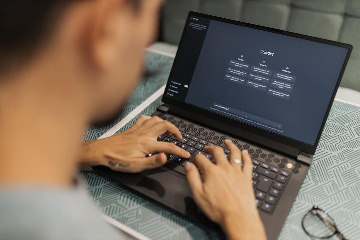 AI engineer using laptop with AI tools and technology