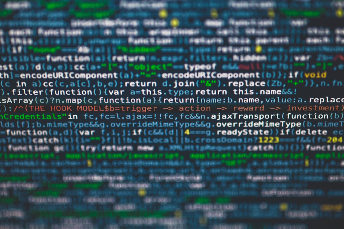 Close-up of programming code on a monitor representing AI development work