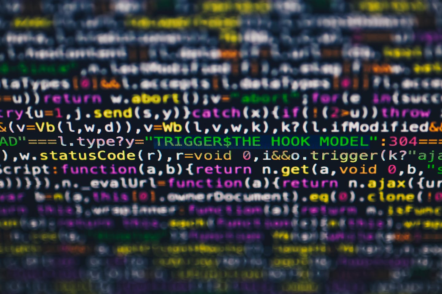 Close-up of programming code on screen representing AI development