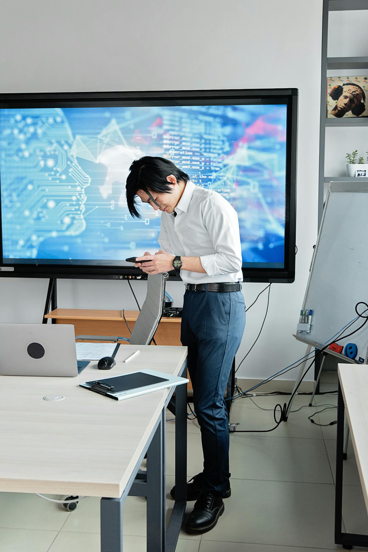 Professional in office working with AI technology on digital screen